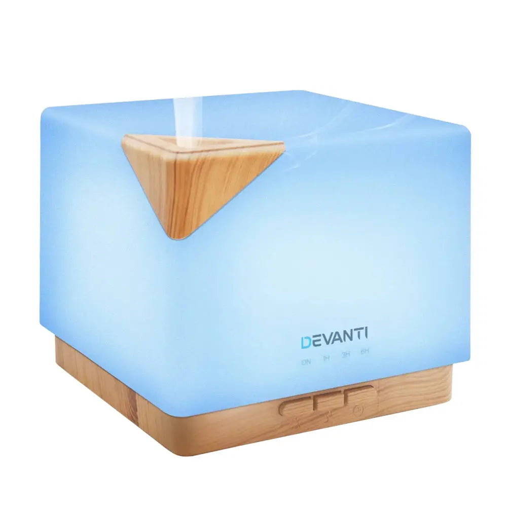 square shaped with blue light and timber base devanti humidifier night light with steam on white background.