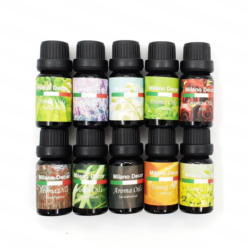 10 bottles of essential oils with different scents on white background