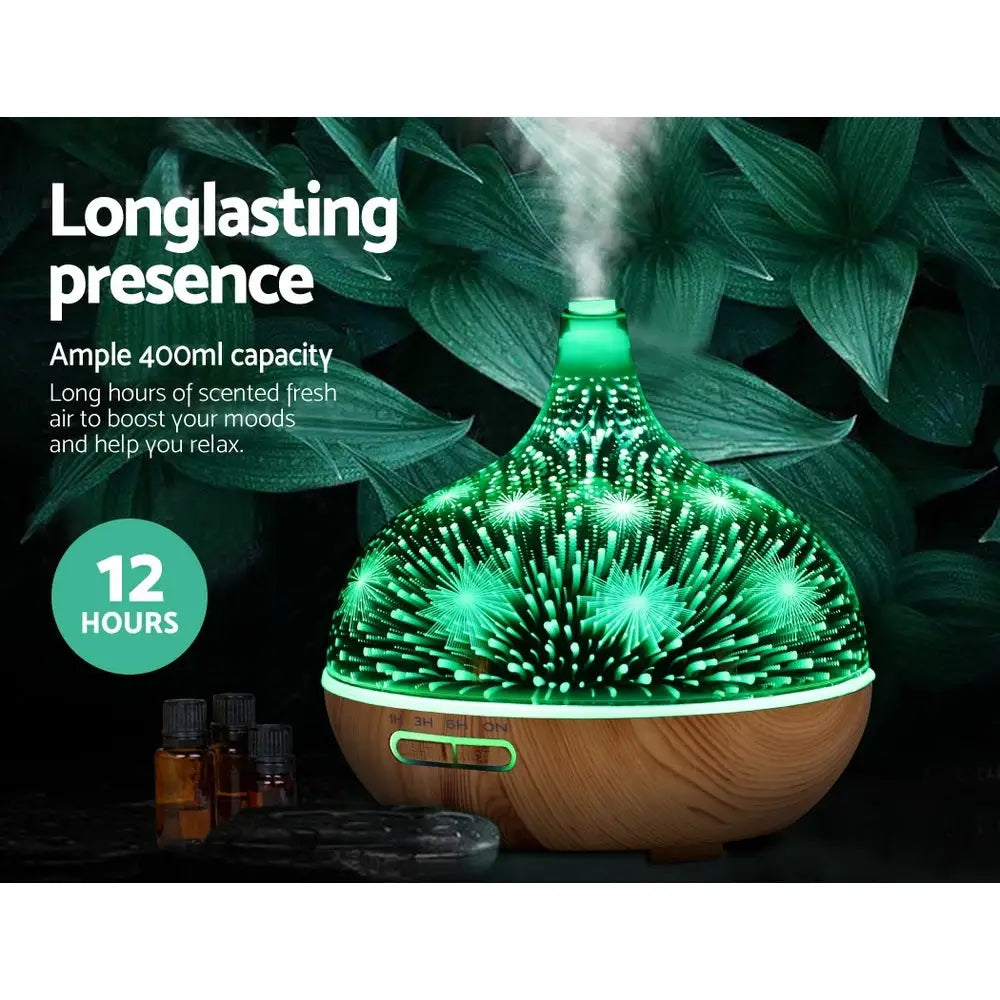 dark green and black lights with light timber base of the 3D firework diffuser in night setting with dark background.