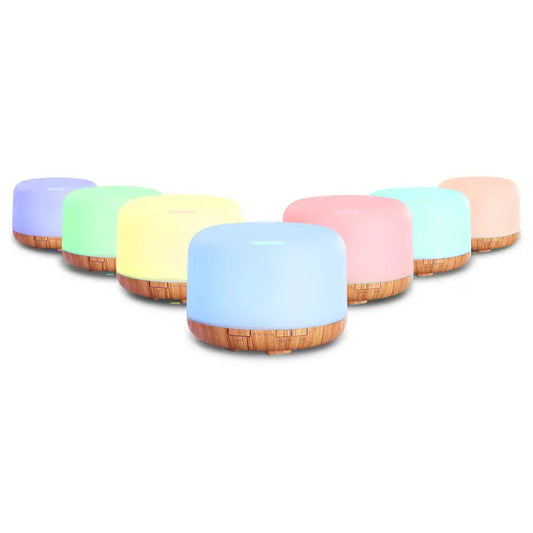 7 different led light colours of the devanti round diffusers in a v shape on white background.
