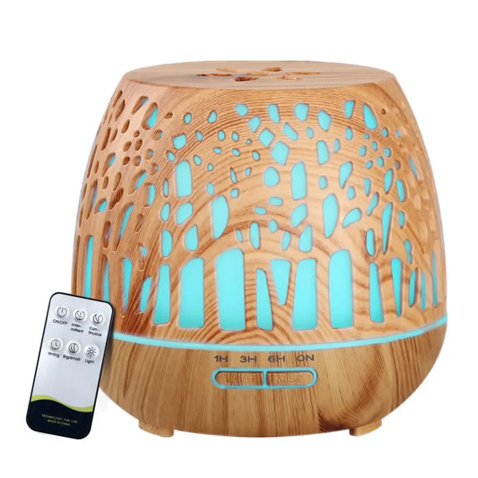 devanti ultrasonic diffuser with forrest patterned light wood grain with silver remote on white background.